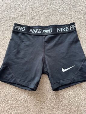 Nike Black Athletic Compression Shorts with White Swoosh